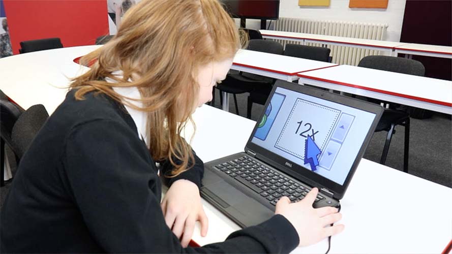 School pupil in class using SuperNova Magnification