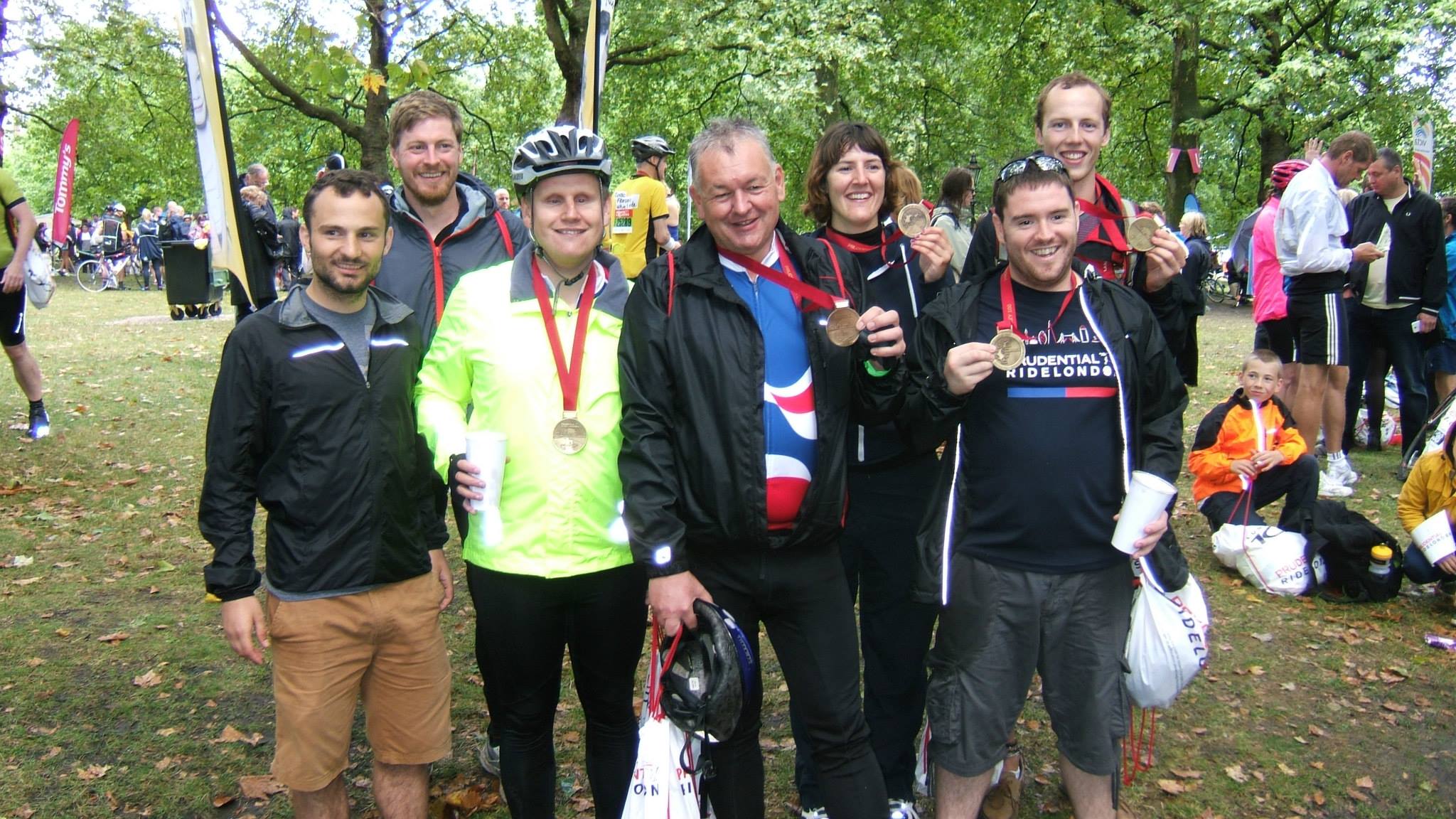 Team members looking happy with their medals at the end of the race