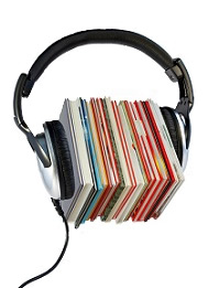 Image of headphones around a stack of books
